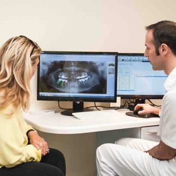 Hugh Cowley offers dental implants at Elmsleigh House Dental Clinic in Farnham, Surrey
